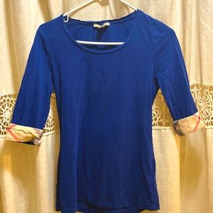 Burberry blue quarter sleeve shirt with Burberry plaid sleeve